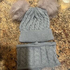 Knitted hat with super cute puffs and matching neck warmer. New